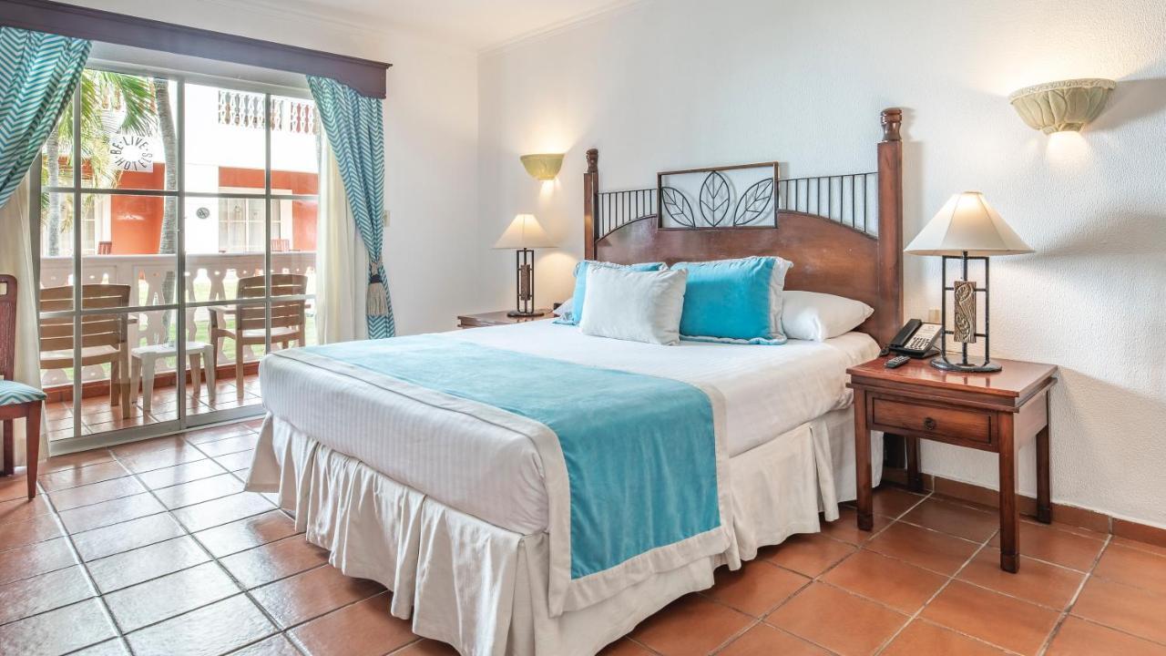 บี ลีฟ คอลเลคชั่น มาเรียน - ออล อินคลูซีฟ Hotel Puerto Plata ห้อง รูปภาพ A bedroom at the Iberostar Grand Hotel Bávaro