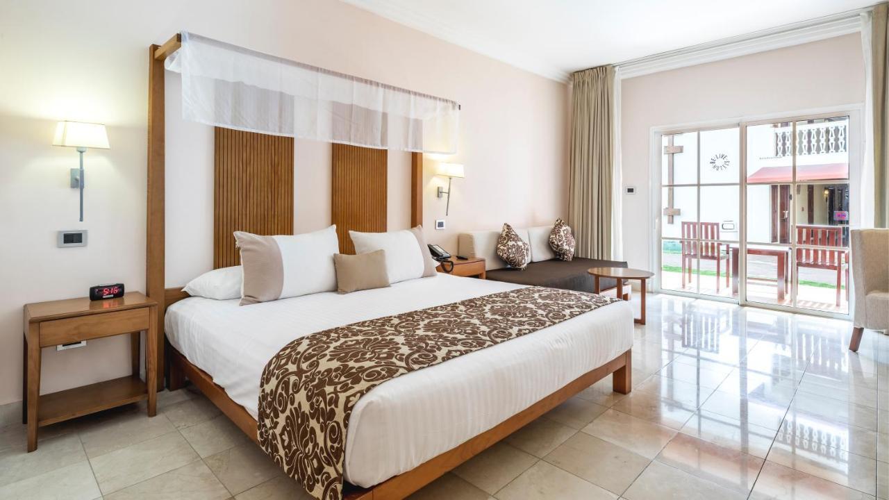 บี ลีฟ คอลเลคชั่น มาเรียน - ออล อินคลูซีฟ Hotel Puerto Plata ห้อง รูปภาพ A bedroom at the hotel